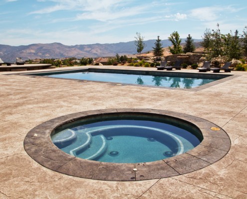 Custom In-Ground Spa with Pool and Patio